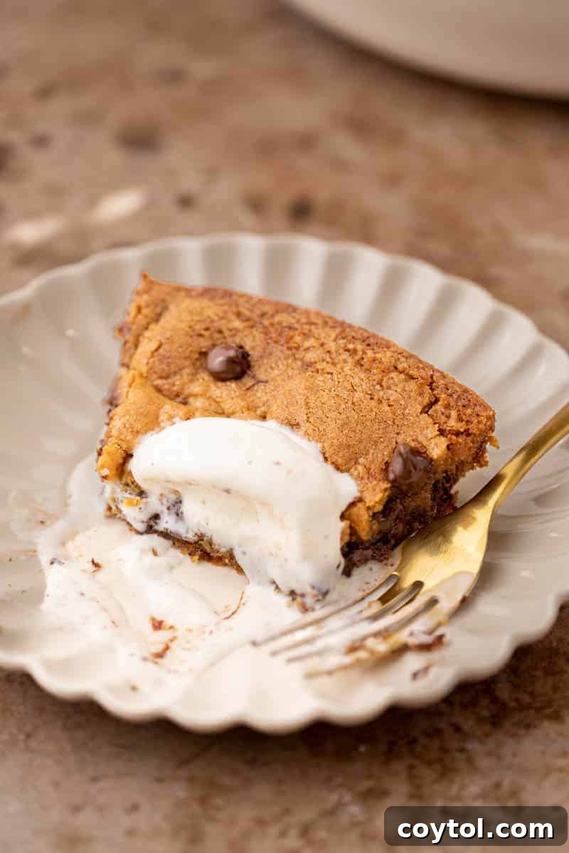 Slice of skillet cookie on a plate