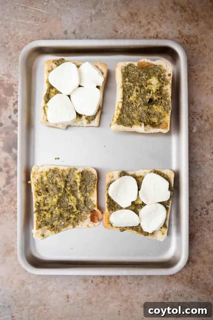 Starbucks-Inspired Roasted Tomato Mozzarella Panini 7 Sandwich mise en place with focaccia and pesto