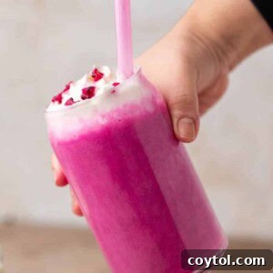 Hand holding Starbucks Barbie frappuccino