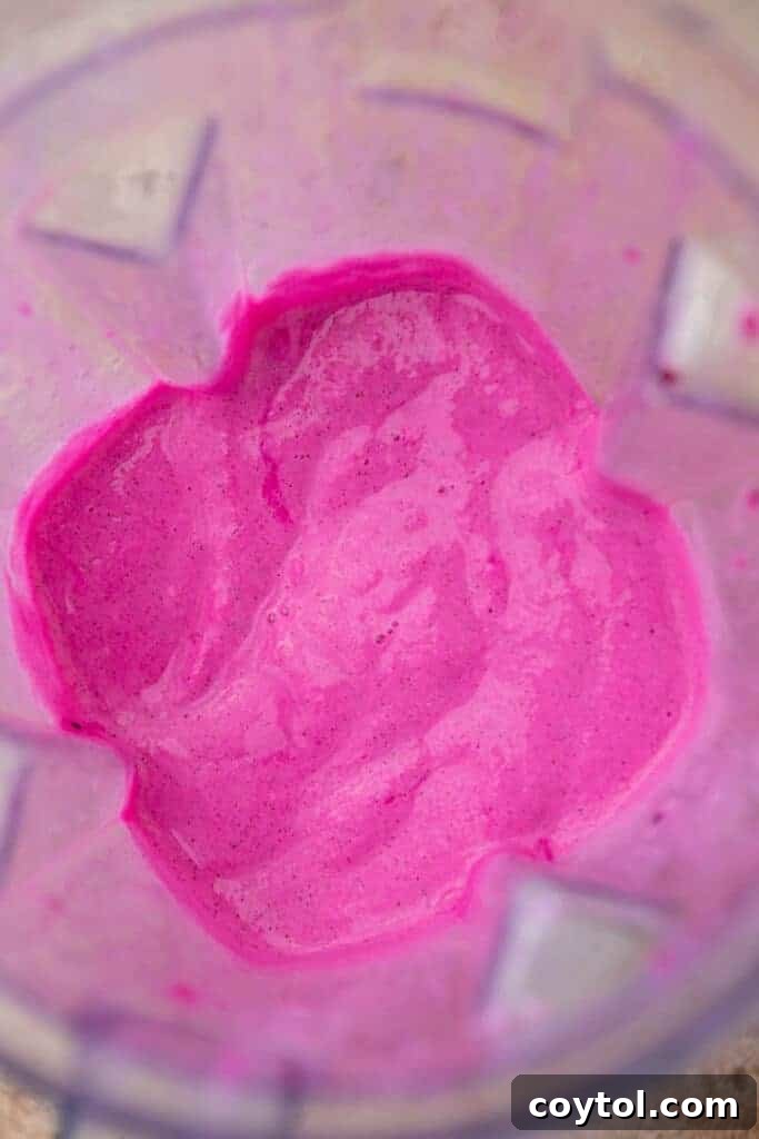 Pink Frappuccino blending in a high-speed blender