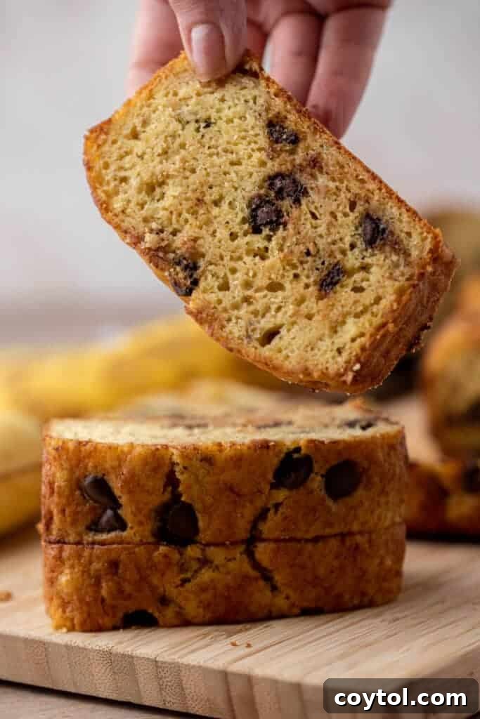 A stack of three quick bread loaves made with cake mix, featuring visible chocolate chips.