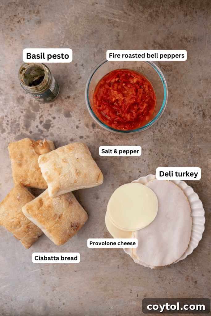 The Ultimate Starbucks Turkey Pesto Panini Guide 3 Ingredients on the counter for turkey pesto panini