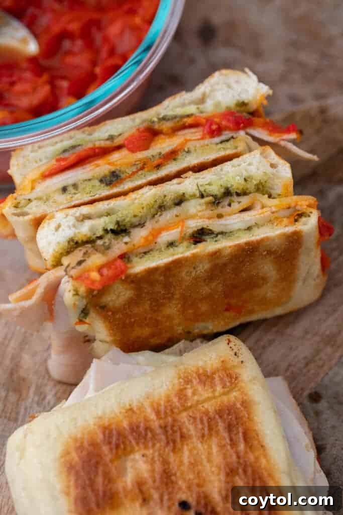The Ultimate Starbucks Turkey Pesto Panini Guide 6 Starbucks turkey pesto sandwich sliced in half