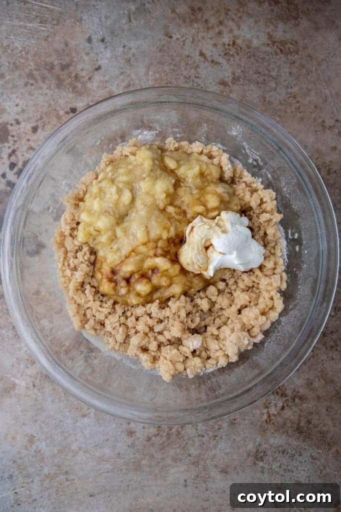 Banana bread mixture in bowl