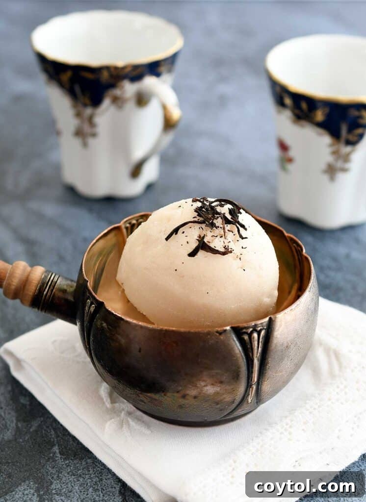 A close-up of a delicious vegan London Fog ice cream, showcasing its creamy texture and unique flavor profile.