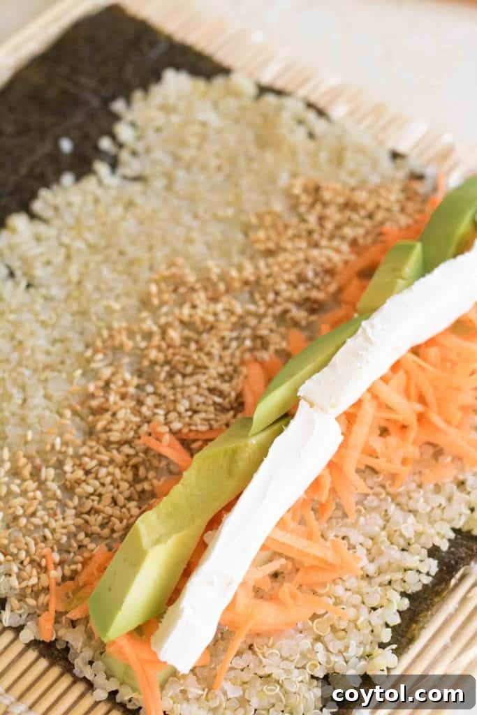 Crafting Vibrant Veggie Quinoa Sushi 13 Cream cheese and sesame seeds added to the sushi filling.