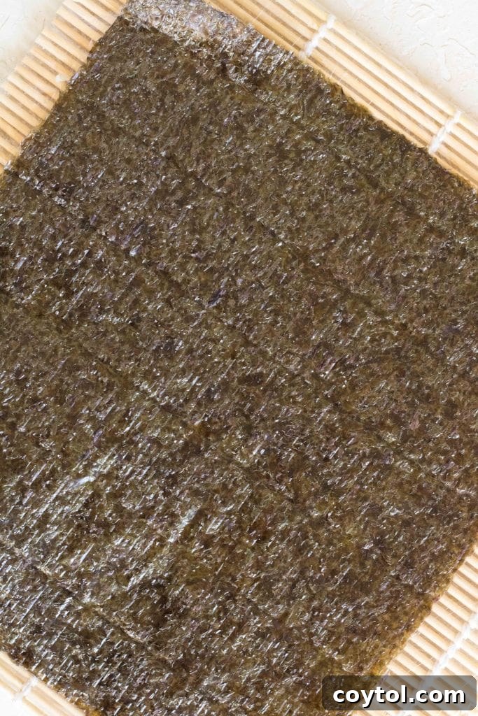 Crafting Vibrant Veggie Quinoa Sushi 6 Close-up of a bamboo mat, an essential tool for rolling homemade sushi.