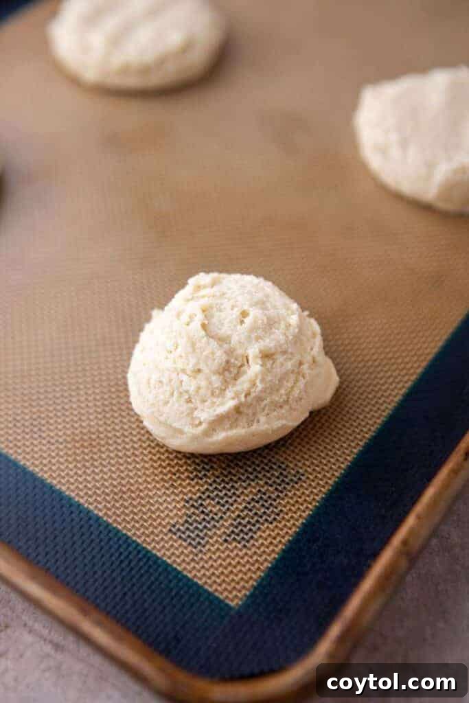 Crumbl Vanilla Bean Cupcake Dream Cookie 7 Cookie dough on baking sheet