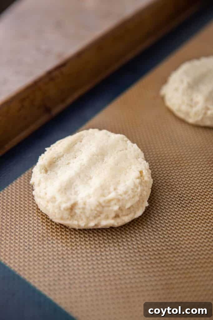 Crumbl Vanilla Bean Cupcake Dream Cookie 8 Cookie dough on baking sheet