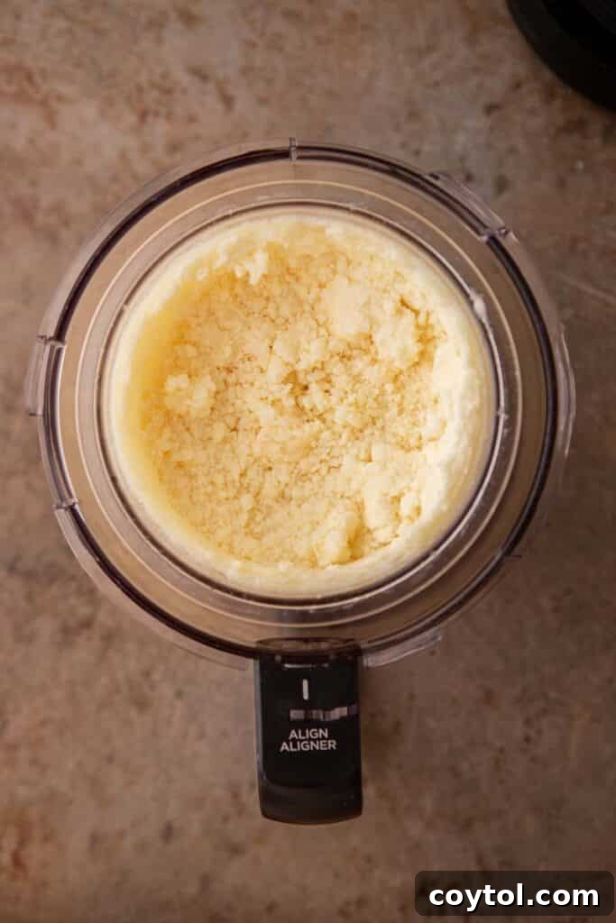 Ninja Creami Pineapple sorbet being processed in the machine