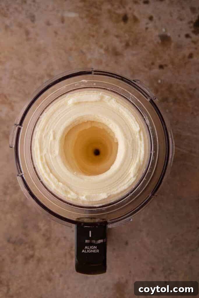 Freshly spun Ninja Creami Pineapple sorbet in the pint cup