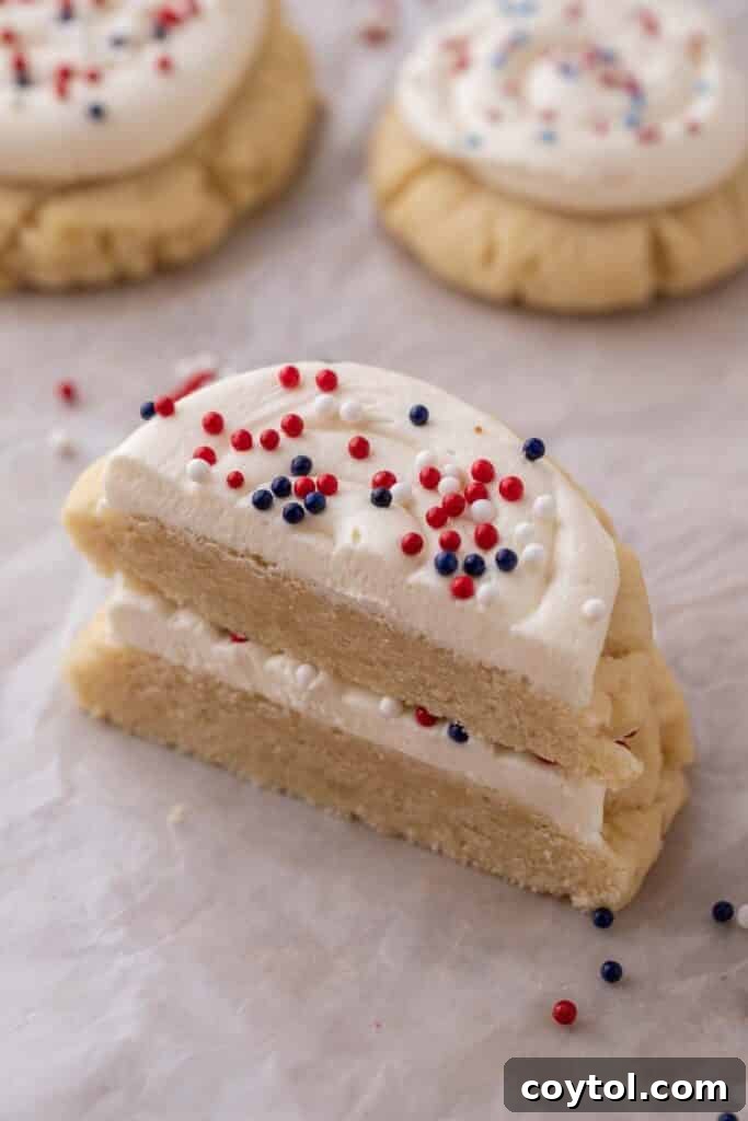 Crumbl All-American Birthday Cake Cookies 2 Festive Crumbl patriotic sugar cookies with red, white, and blue sprinkles
