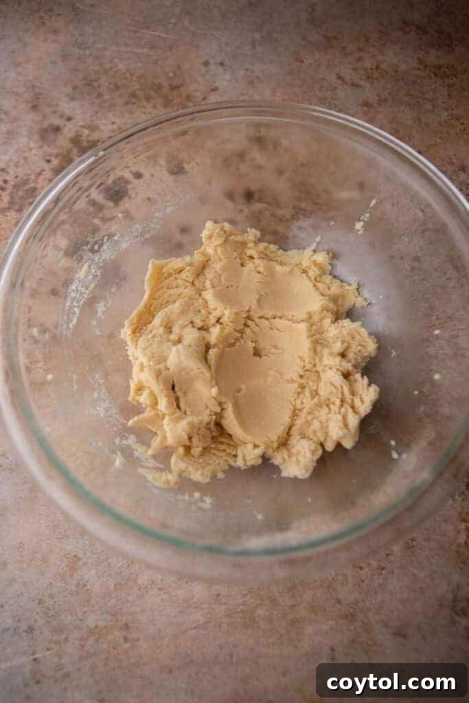 Crumbl All-American Birthday Cake Cookies 6 Cookie dough mixture in a bowl before adding dry ingredients