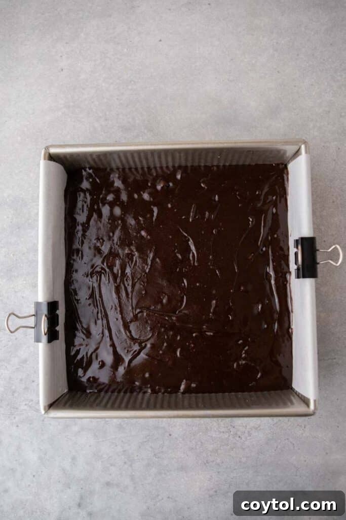 smores brownie batter in a pan