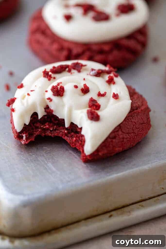 Red velvet cupcake cookie with a bite taken out of it