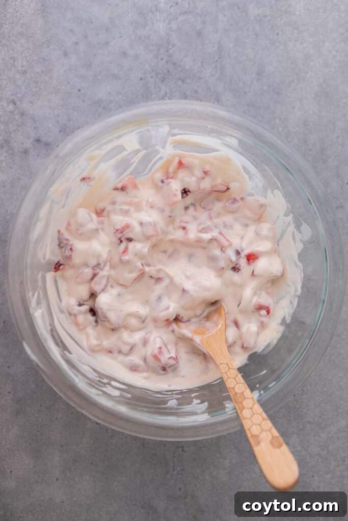 Decadent Chocolate Strawberry Yogurt Bites 6 Smooth and creamy strawberry yogurt mixture in a bowl after combining all ingredients