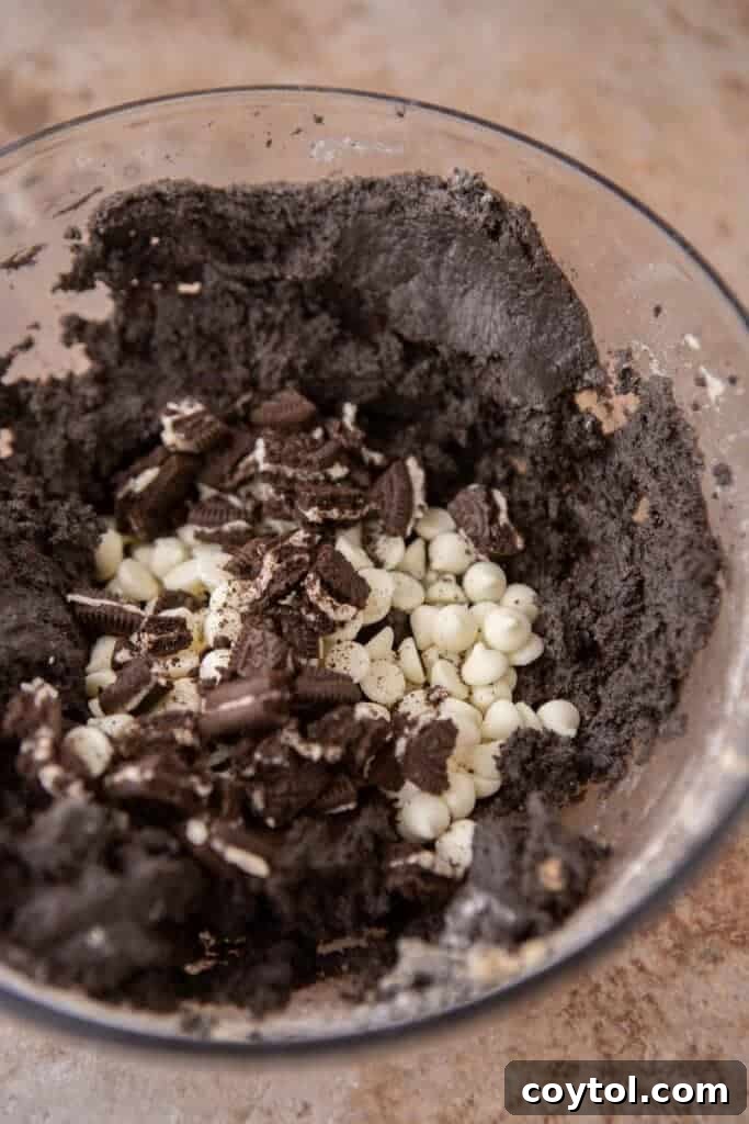 Crumbl Chocolate Cookie Cream Bliss 6 Cookie dough with dry ingredients partially mixed in