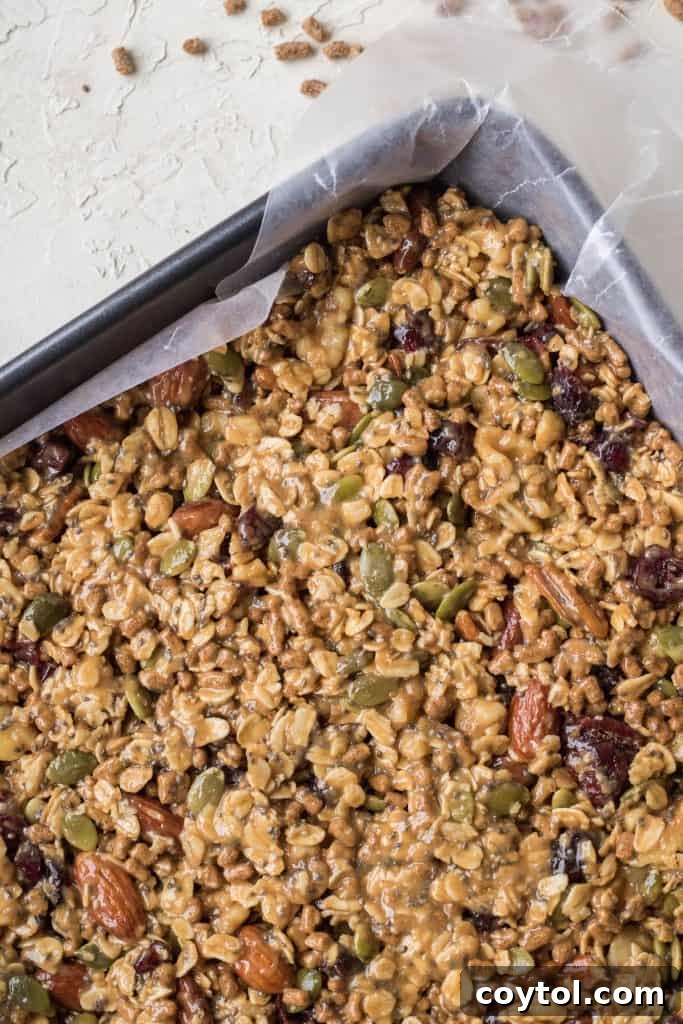 Perfectly pressed trail mix energy bars chilling in the refrigerator.