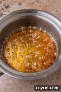 Ultimate Homemade Caramel Coffee Syrup 10 Golden caramel in a pan