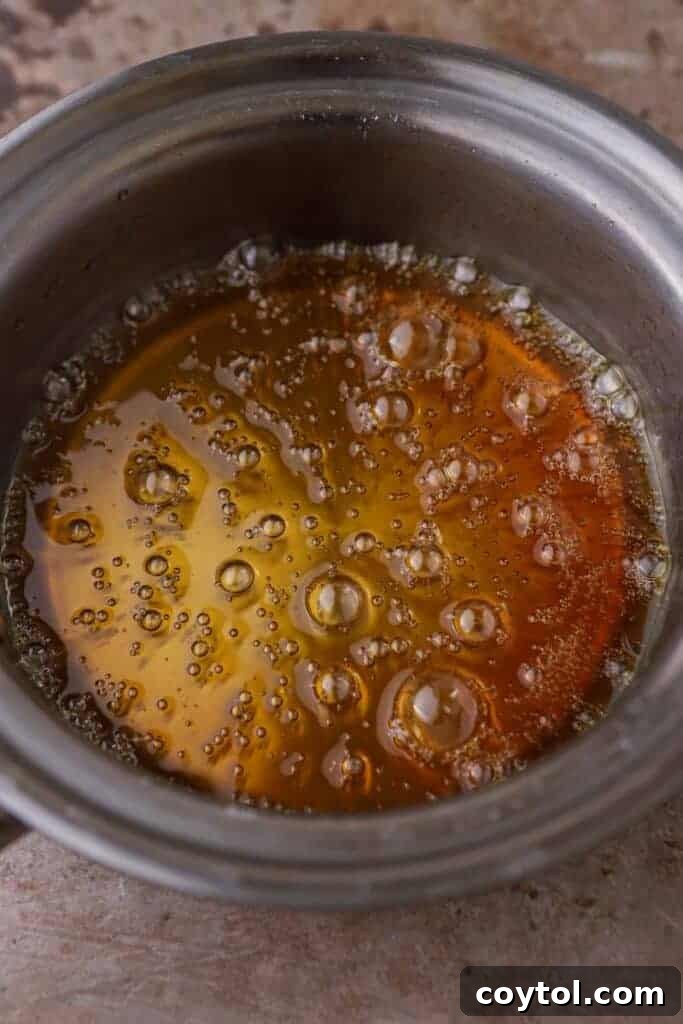 Ultimate Homemade Caramel Coffee Syrup 5 Bubbling caramel in a pan