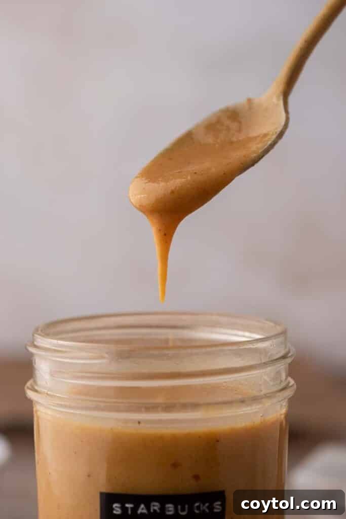 Spoonful of Starbucks pumpkin spice sauce sauce