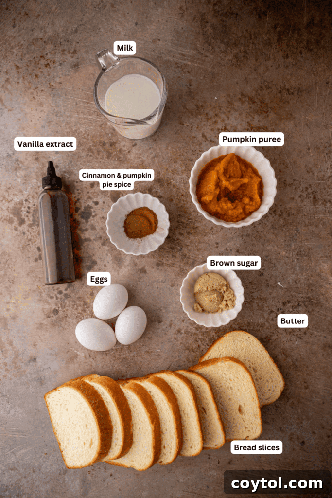 Effortless Pumpkin French Toast Delight 3 Assortment of fresh ingredients laid out on a kitchen counter, including milk, pumpkin puree, eggs, brown sugar, salt, vanilla extract, pumpkin pie spice, and cinnamon, ready for making pumpkin French toast.