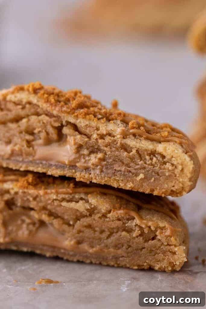 Close up of Crumbl cookie butter lava cookies with melted cookie butter oozing out.
