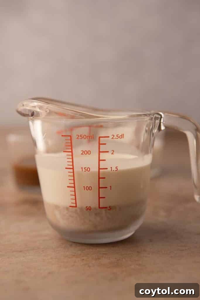 Starbucks' Latest Fall Delight: The Iced Pumpkin Cream Chai Latte 5 Pumpkin cold foam ingredients in a cup
