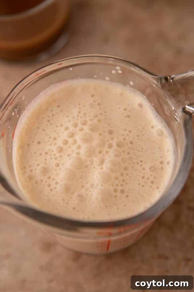 Starbucks' Latest Fall Delight: The Iced Pumpkin Cream Chai Latte 6 Pumpkin cold foam in a cup