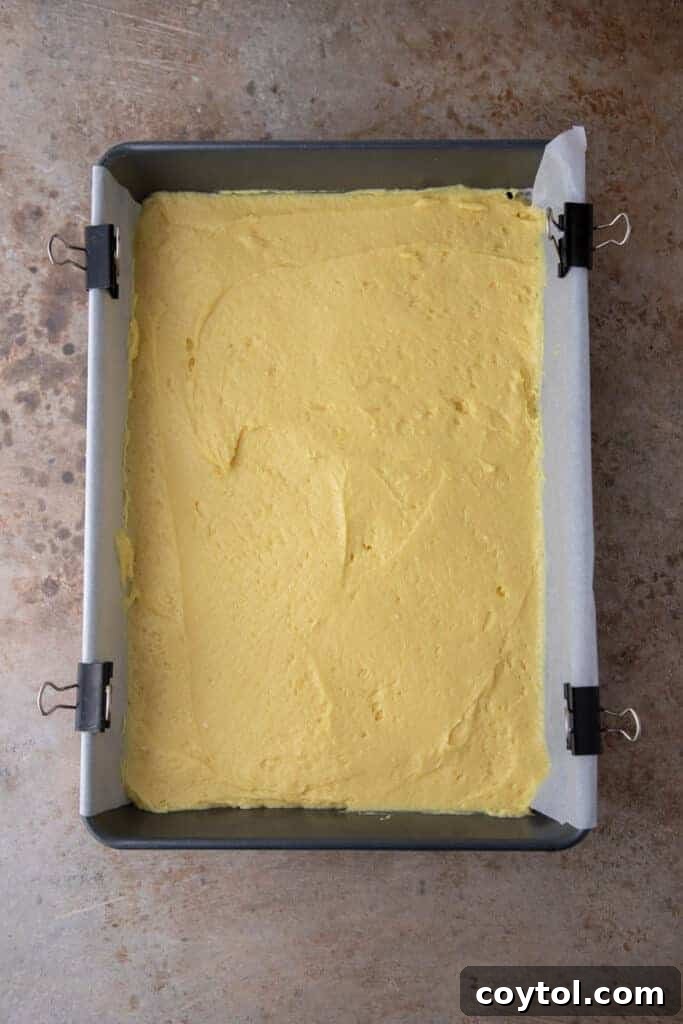 Cake batter in a pan, ready for streusel