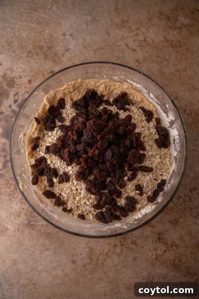 Oatmeal raisin cookie dough in a bowl