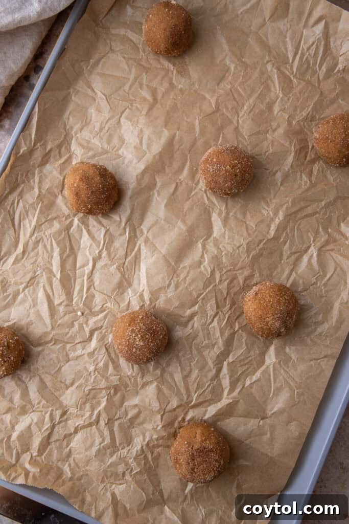 dough balls on a baking sheet