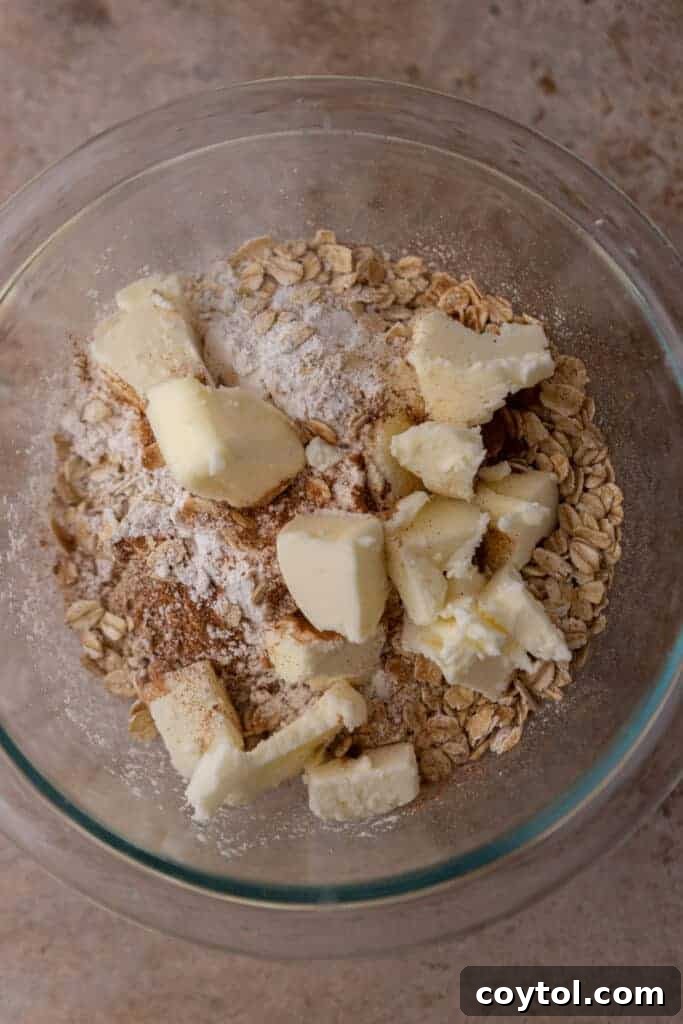 Streusel topping ingredients in a bowl, ready to be mixed for the apple cheesecake bars.