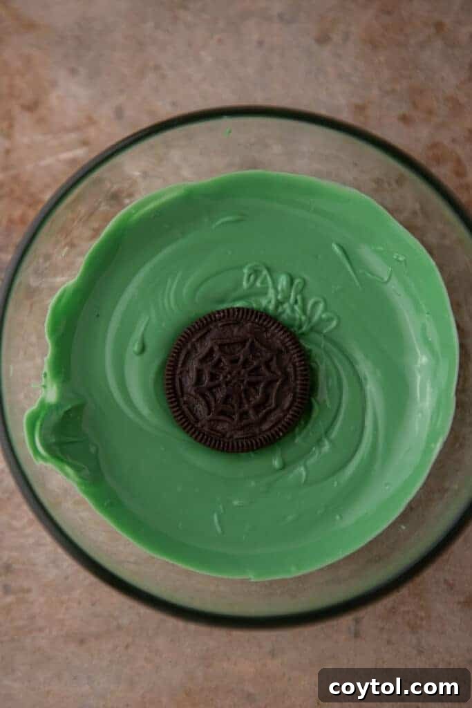Spooktacularly Simple Chocolate Covered Halloween Oreos 5 Oreo dipped in chocolate