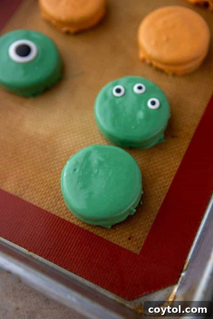 Spooktacularly Simple Chocolate Covered Halloween Oreos 7 Spooky green Halloween oreo