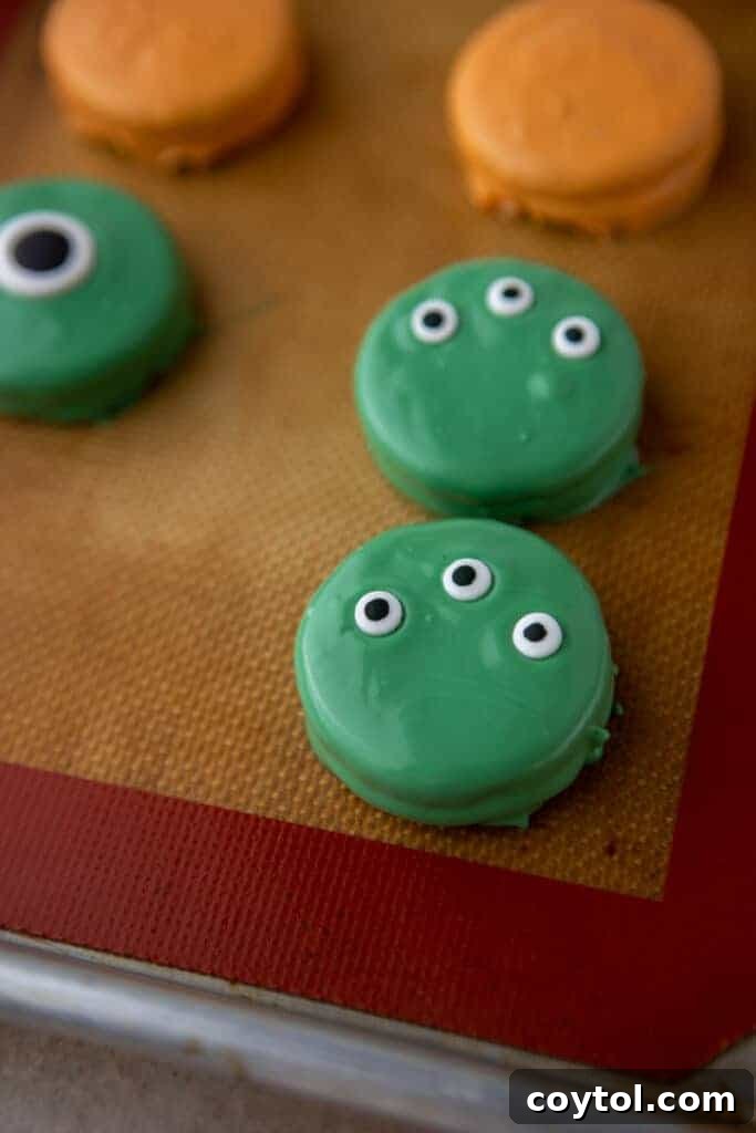 Spooktacularly Simple Chocolate Covered Halloween Oreos 8 Spooky green Halloween oreo