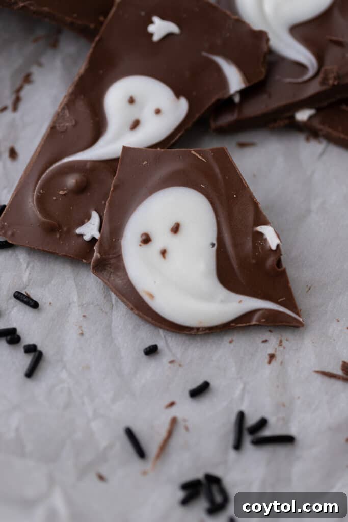 Hauntingly Easy 3-Ingredient Halloween Ghost Bark 2 halloween ghost bark broken into pieces