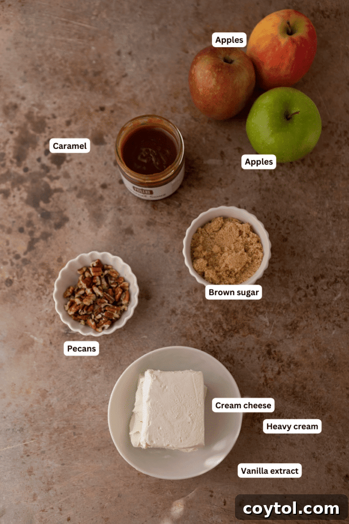 Ingredients for caramel apple cheesecake dip laid out on a kitchen counter