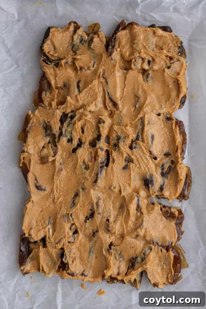 Dates with peanut butter spread evenly on them