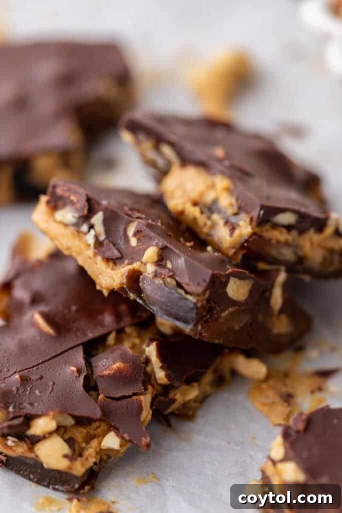 Chopped up date bark with peanut butter and chocolate, ready to eat