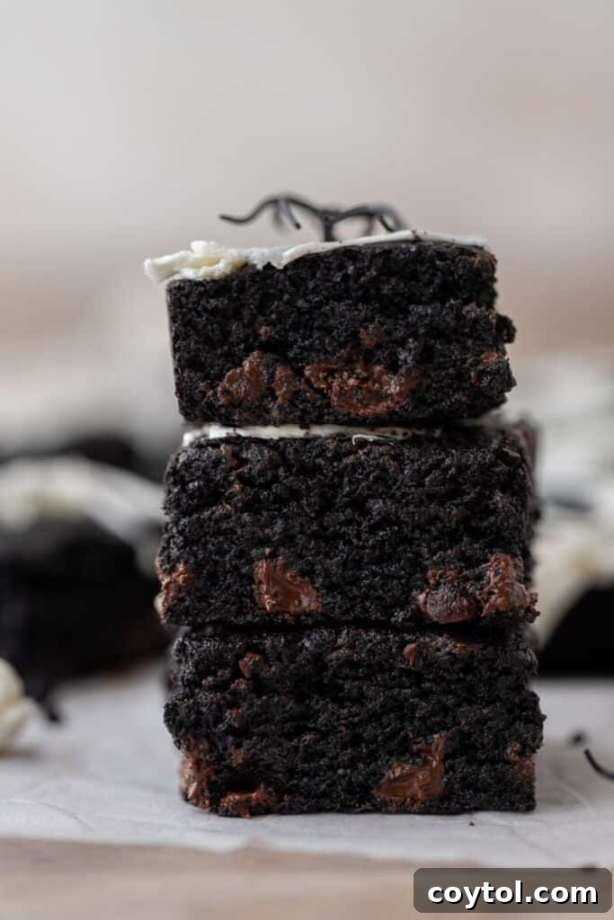 Another stack of black cocoa brownies, highlighting their deep color and irresistible texture.