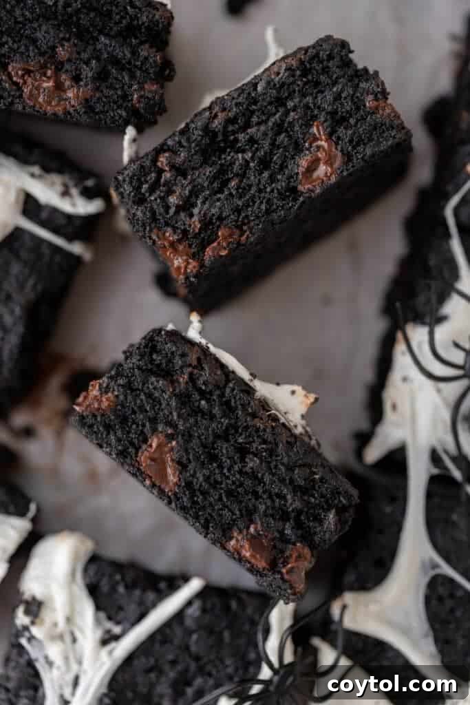 A tray of freshly baked black cocoa powder brownies, ready to be decorated or enjoyed.