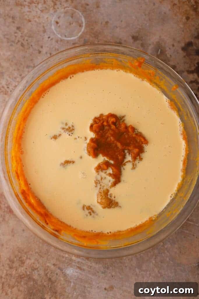 The fully blended pumpkin pie filling, smooth and ready