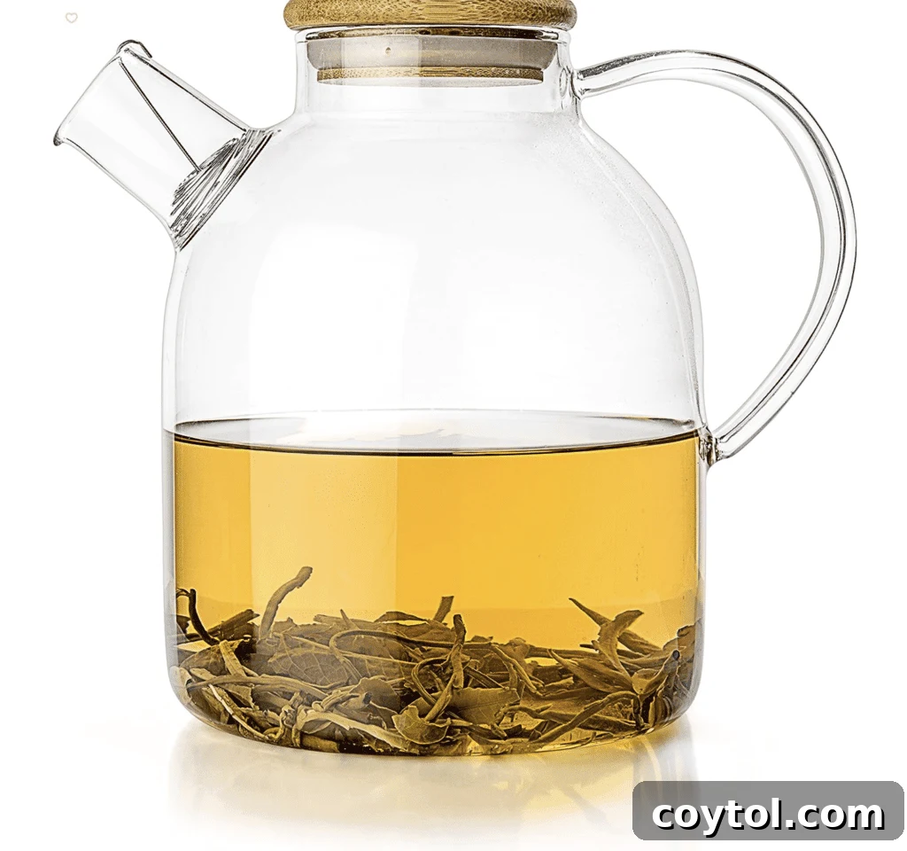 Brewing Joy: Gifts for Every Tea Lover 12 Glass stovetop kettle, showcasing tea brewing process.
