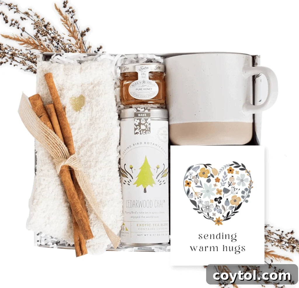 Brewing Joy: Gifts for Every Tea Lover 18 Self-care tea gift box with socks, mug, tea, and honey.