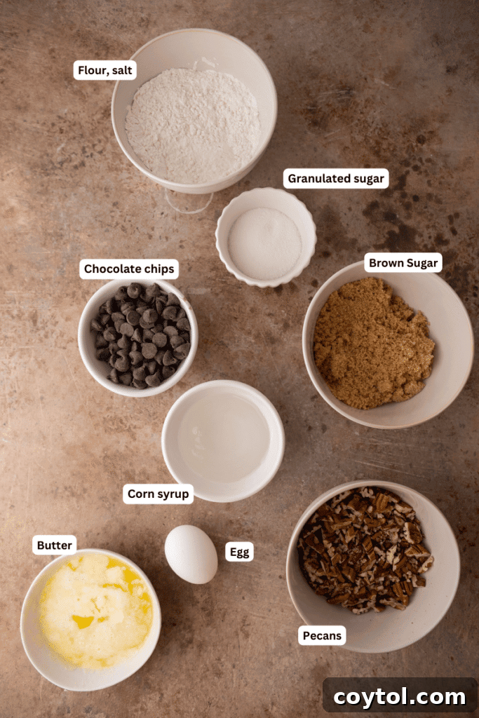 Ingredients for chocolate pecan pie bars laid out on a kitchen counter