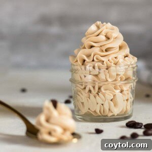 Small batch coffee frosting recipe for brownies with no cocoa powder, showing a perfectly smooth texture.
