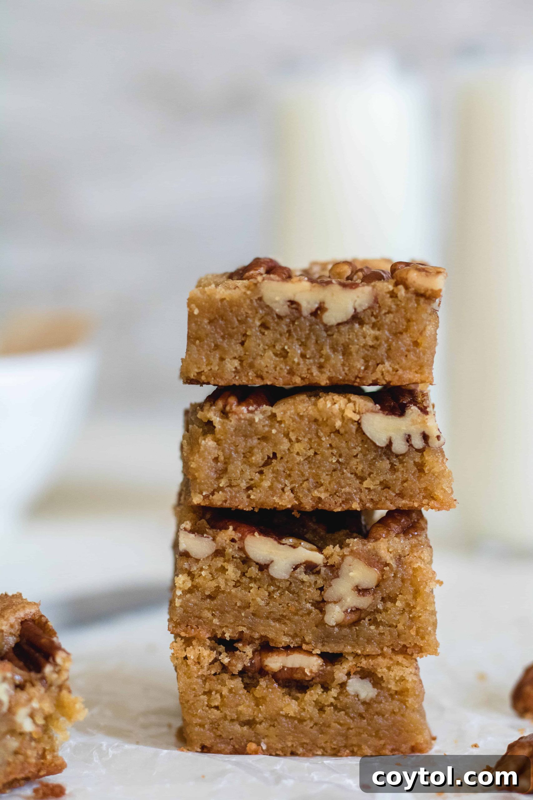 Deliciously fudgy brown butter pecan blondies, cut into perfect squares.