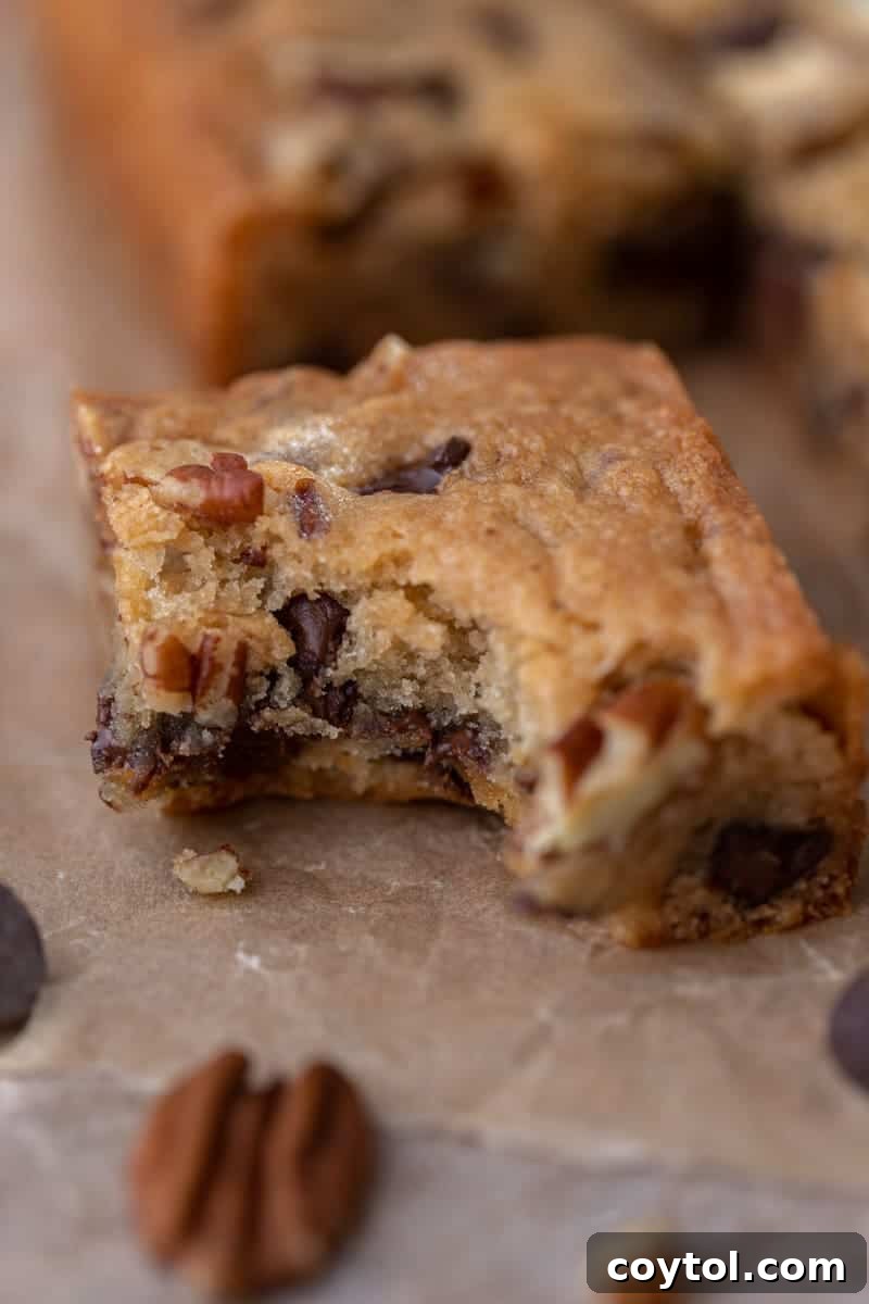 Irresistible pecan chocolate chip blondies, showcasing their rich, chewy texture.