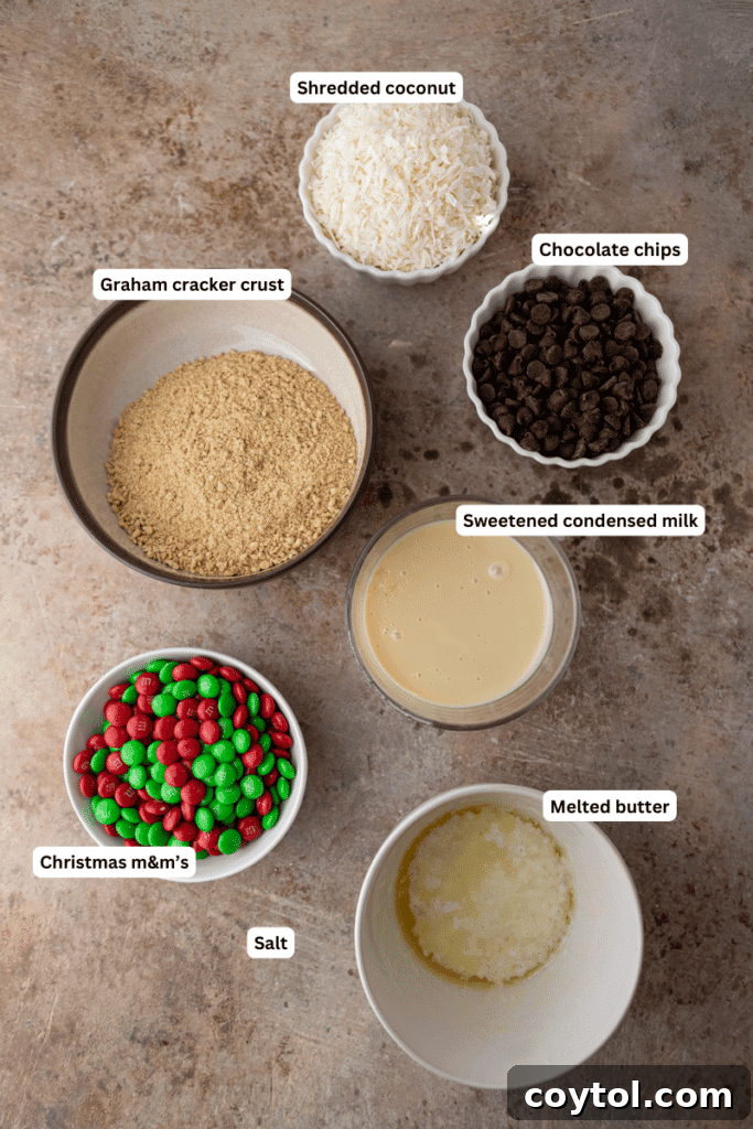 Various ingredients laid out for making Christmas Magic Cookie Bars